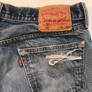 501 Levi’s distressed shorts 36